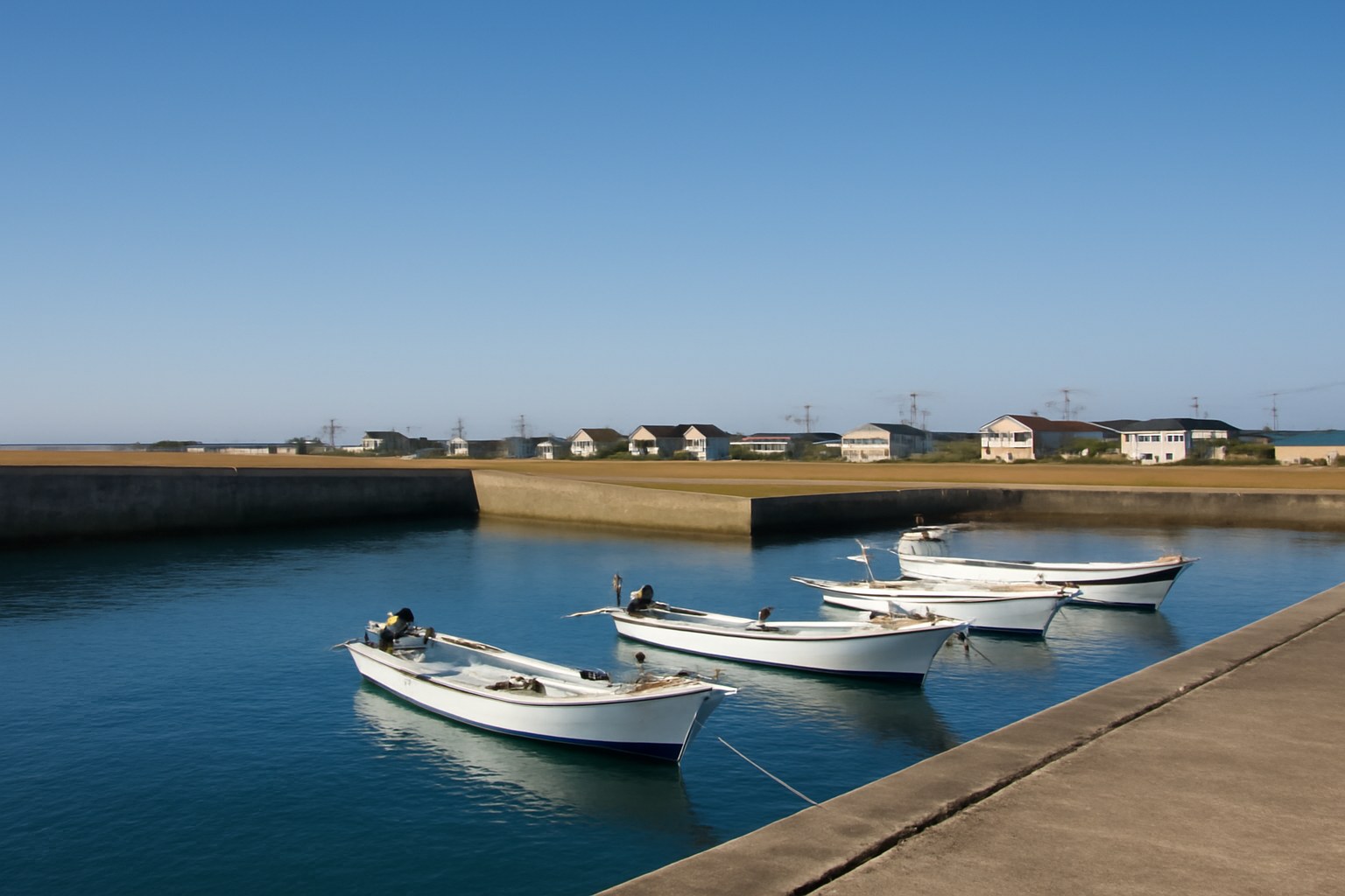 防波堤のある小さな漁港（AIで作成したイメージ）